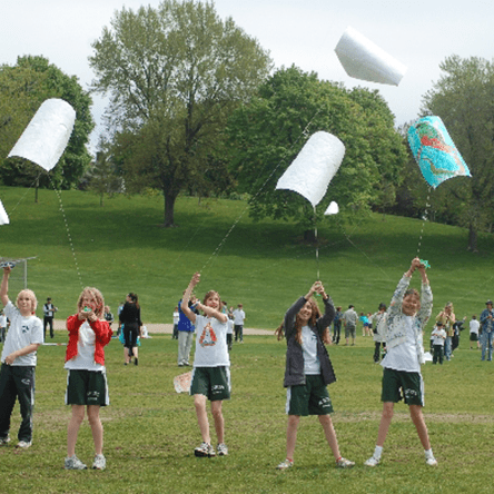 kites-classroom-activity children flying kites as part of school activity
